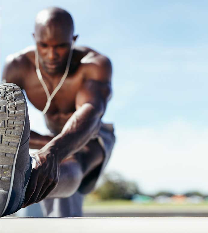 Athlete stretching before performance