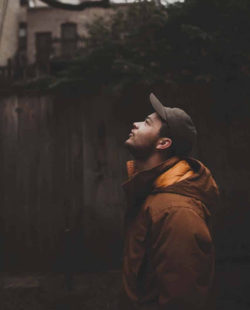 Man looking up thoughtfully