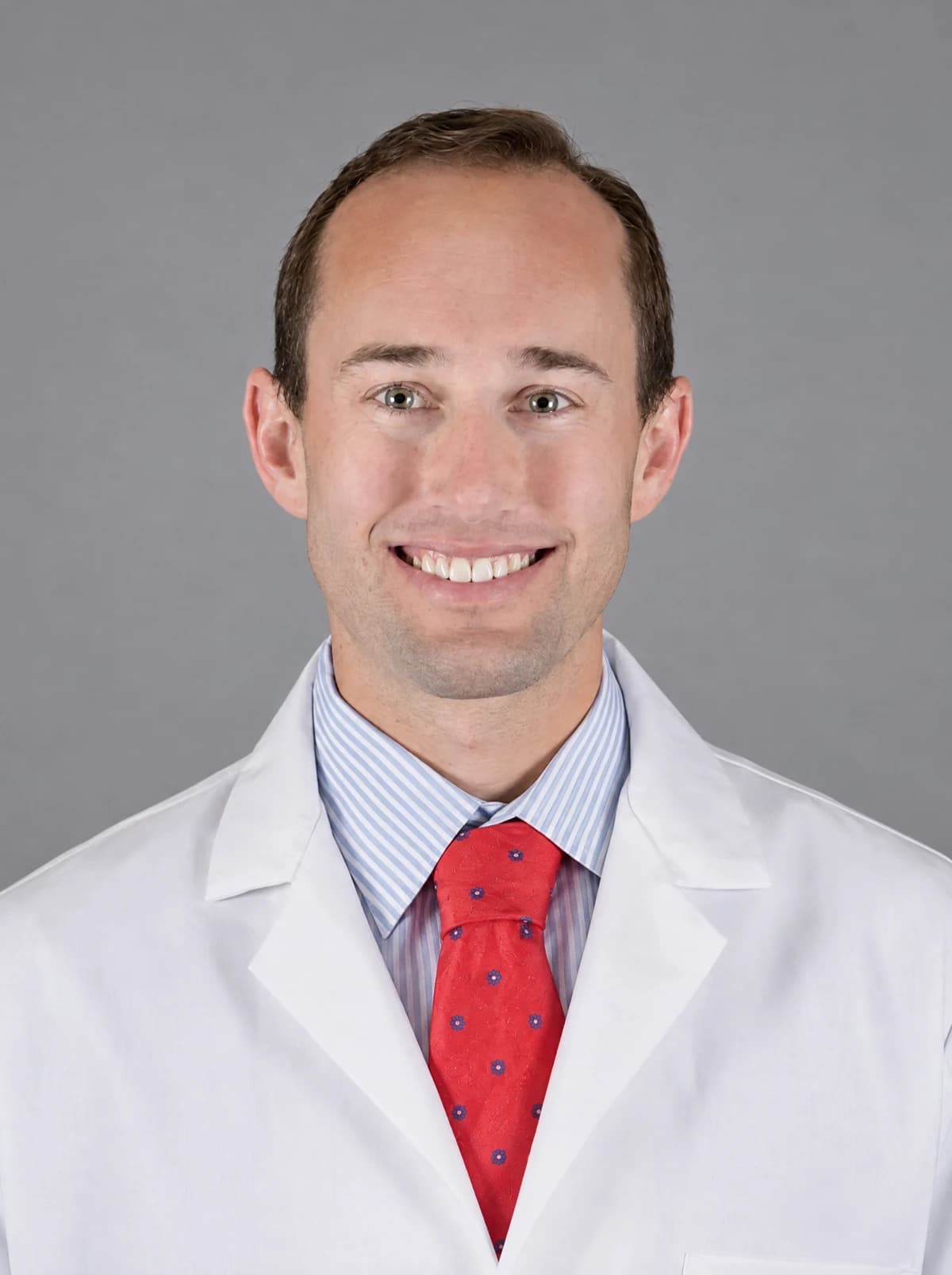 Ethan Gore, M.D., in a clinical portrait